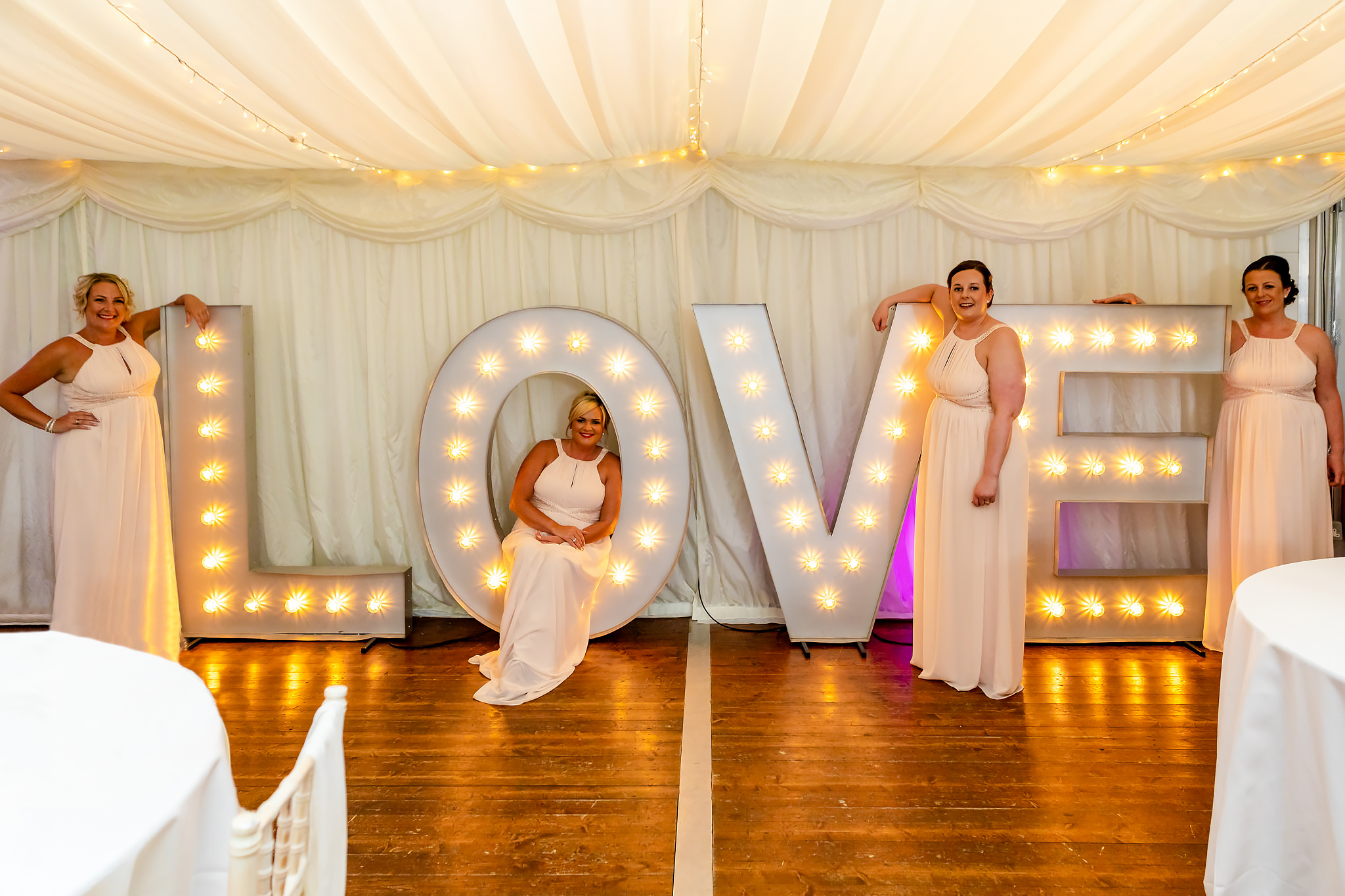 Bryngarw House Wedding Photography - Bridesmaids in Love sign