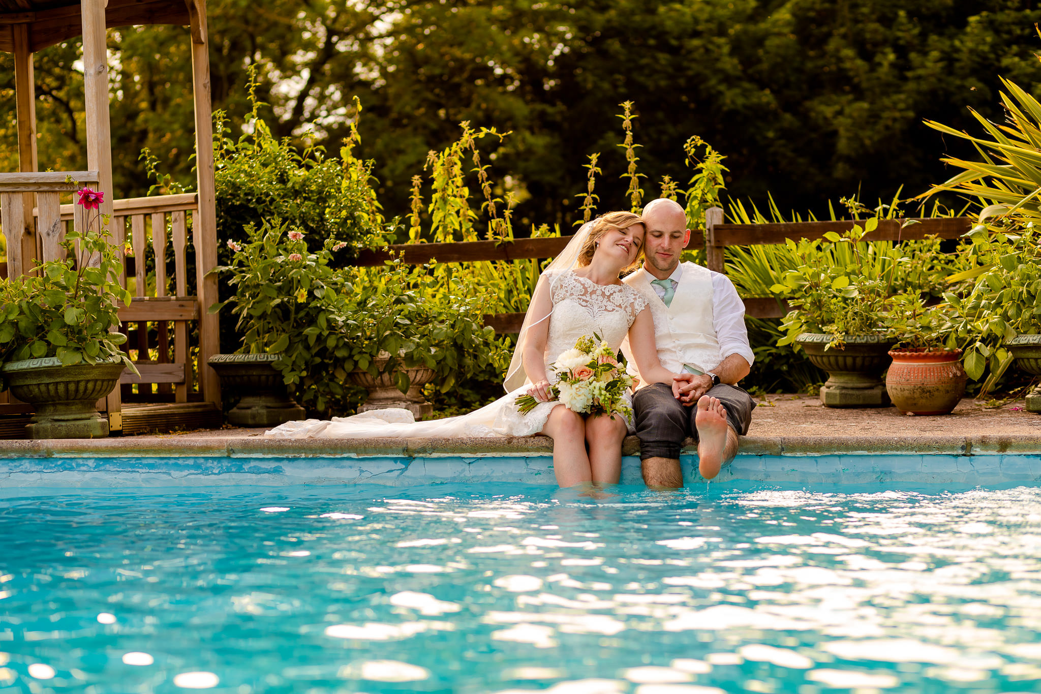 Art by Design - Caer Llan Wedding Photography - Bride and Groom in the pool