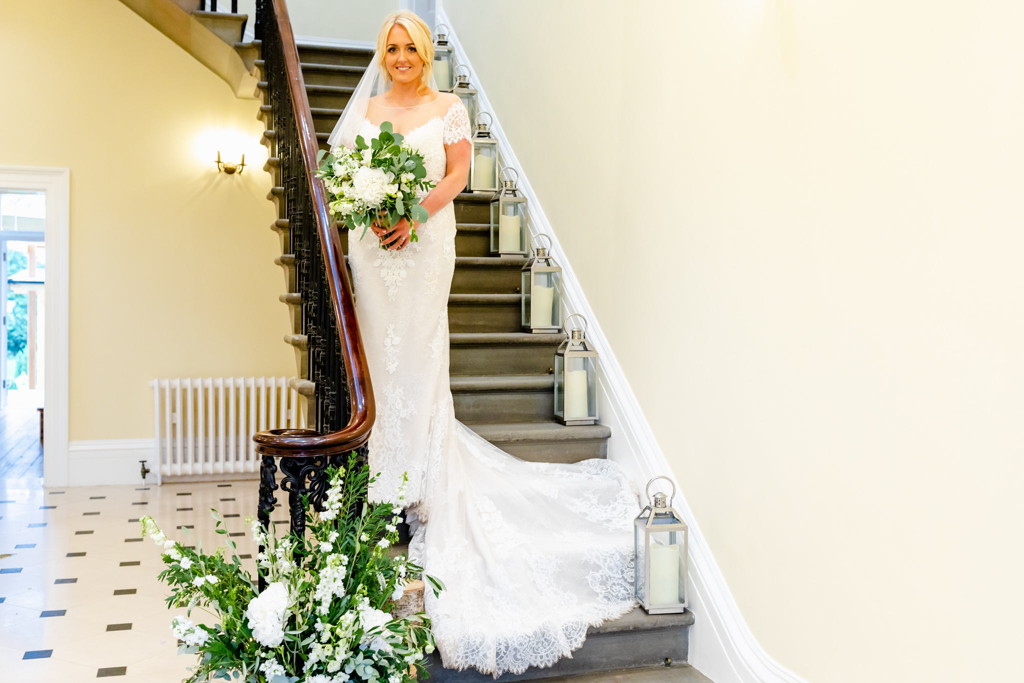 St Tewdrics House Wedding - Bride on Stairs | Art by Design Photography