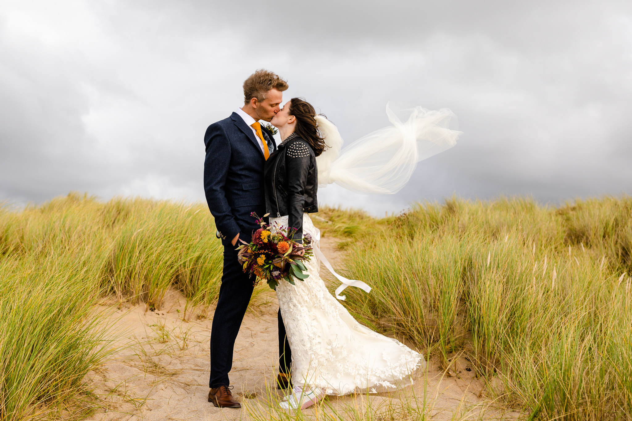 Embracing the storm - Wedding Photography Hollywell Bay, Cornwall