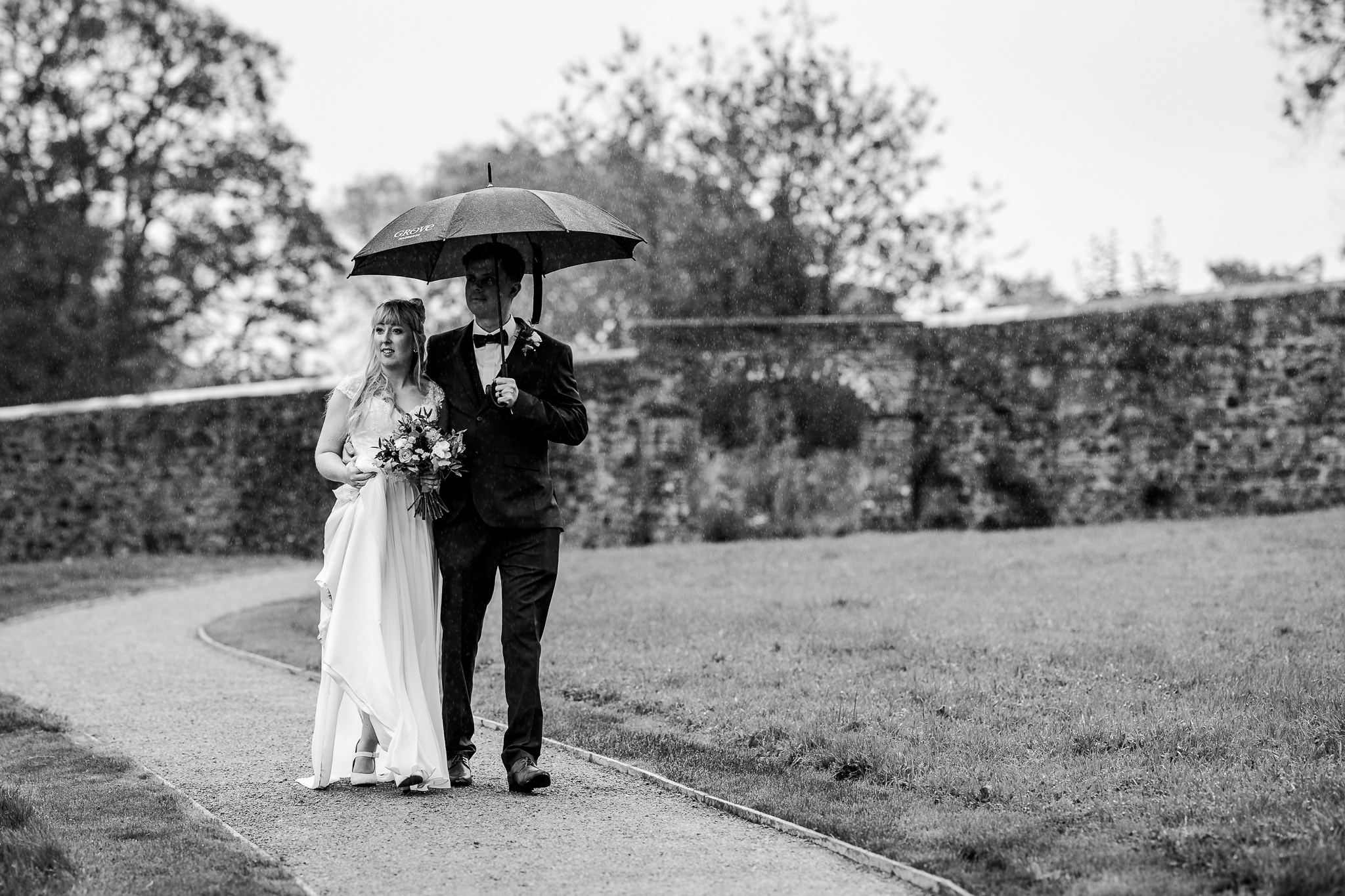 The Grove Narbeth Wedding Photography - Couple in the rain