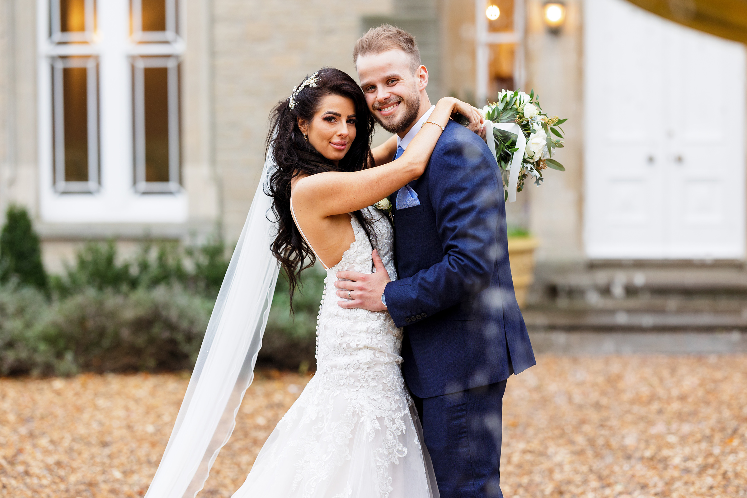 St Tewdrics House Wedding - Bride and Groom by Fountain