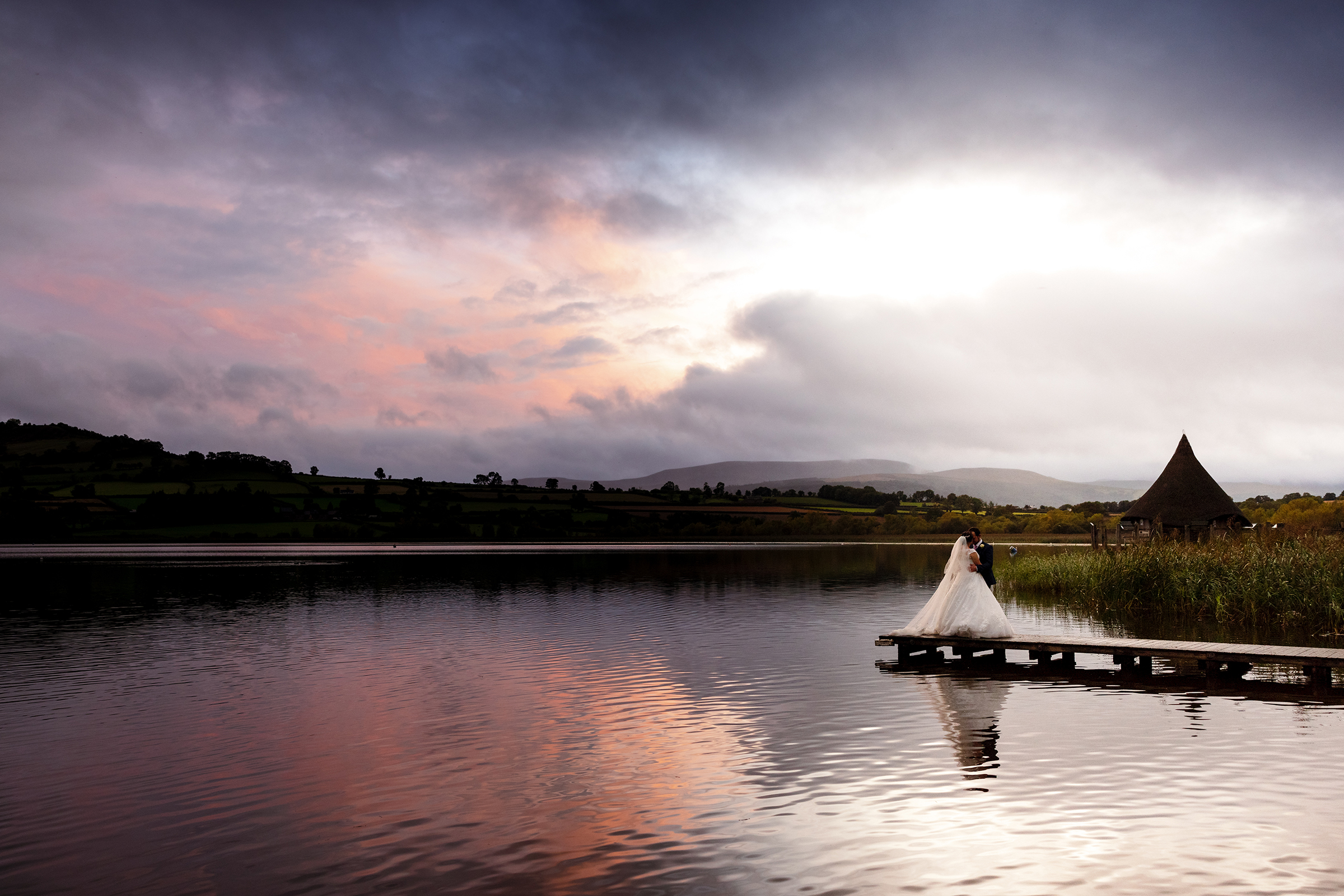 Peterstone Court Wedding - Bride and groom at Llangorse Lake