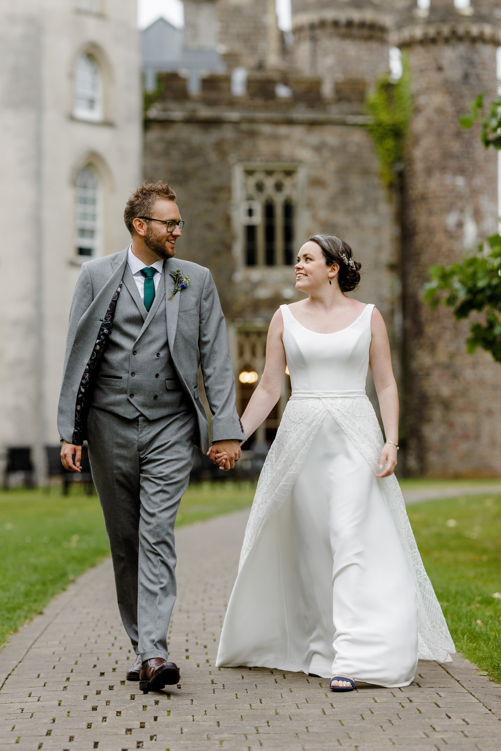 Hensol Castle Wedding - Bride and Groom going for a walk in the grounds 