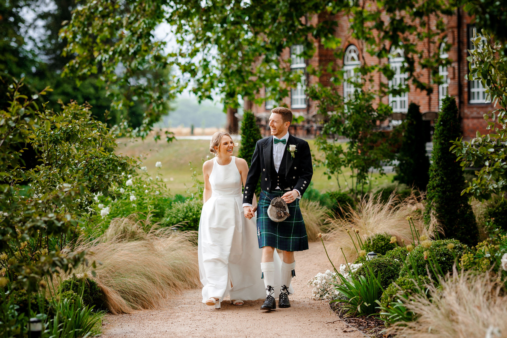 Sant Ffread House Wedding Photography | walking over to the k room