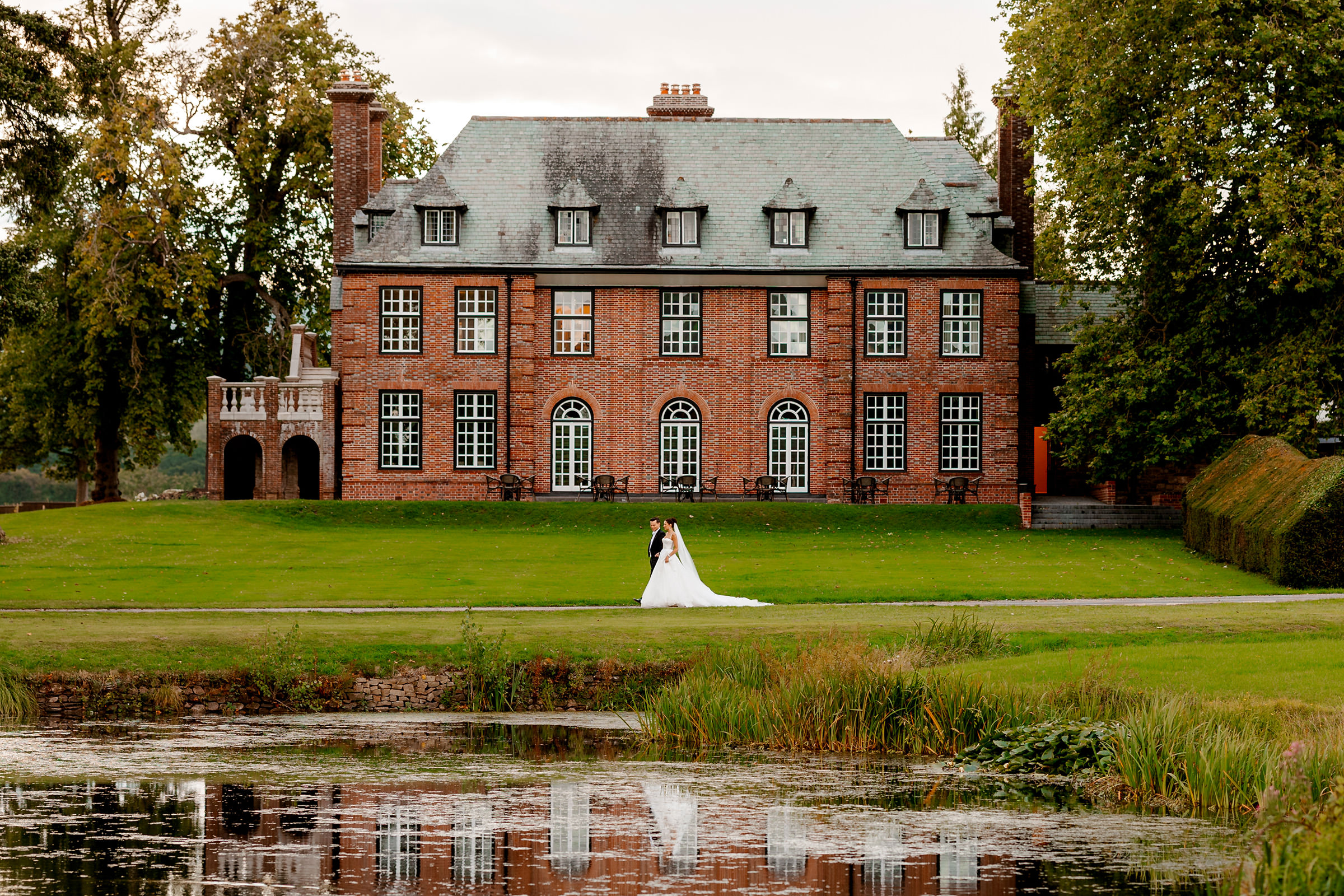 Sant Ffraed House Wedding Photography | Walking in front of the house