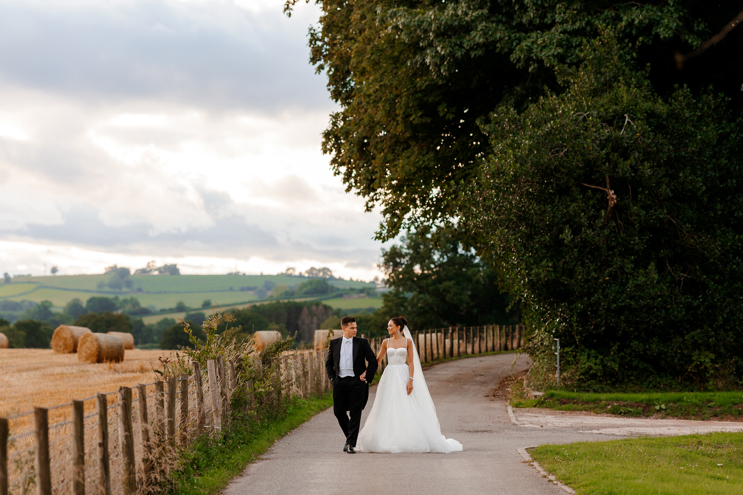 Sant Ffraed House Wedding Photography | Couple walking in grounds