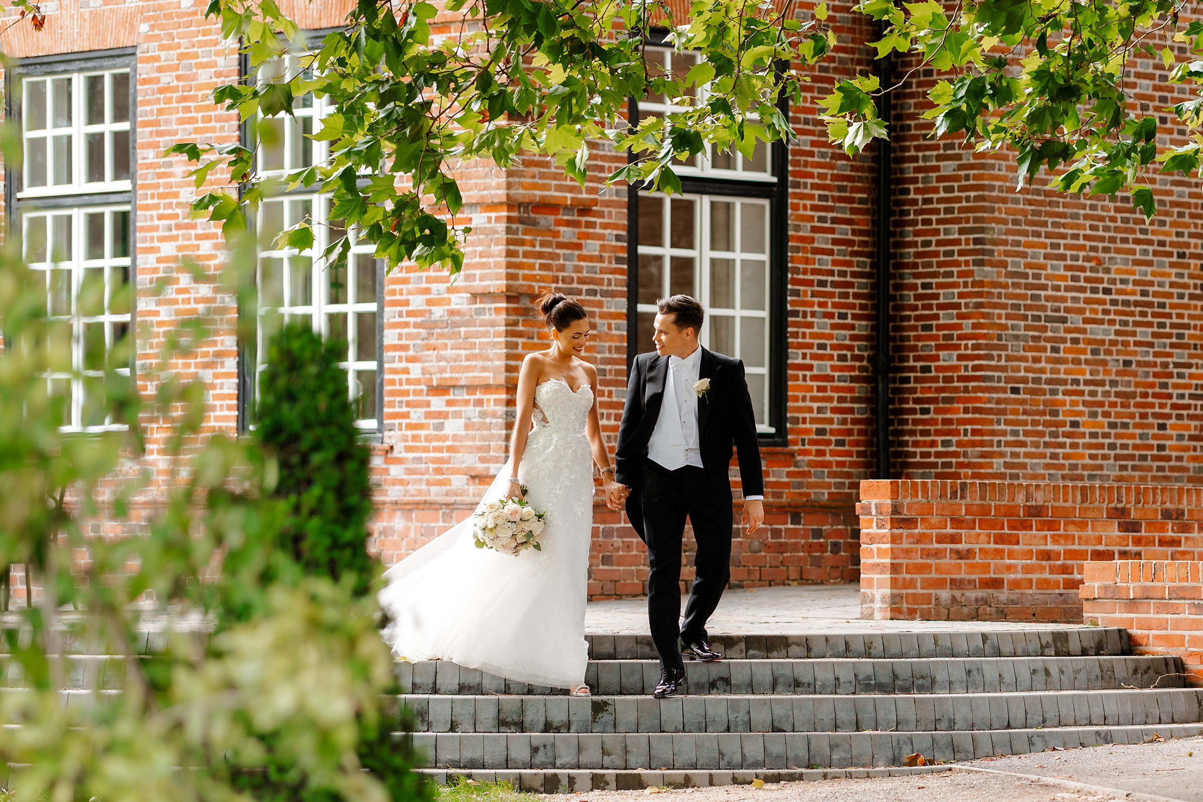 Sant Ffraed House Wedding Photography | Bride and Groom walking