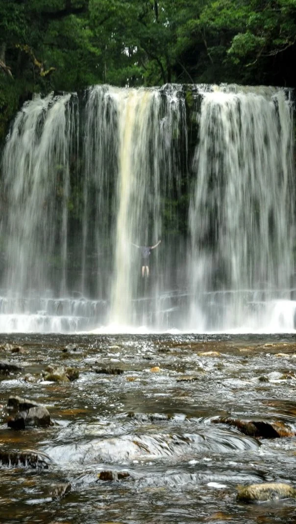 Come with me to photograph a secret wedding proposal behind a waterfall in Wales. 

Clayton and Lauren drove all the way from Coventry under the guise of spreading his mother’s ashes behind Sgwd yr eira which is one of the waterfalls in waterfall country which you can walk behind. But what Lauren didn’t know was that Clayton planned to pop the question and great news she said ‘Yes’.

//

Wedding Proposal Photographer Wales

#weddingproposal #weddingproposalphotographer #sgwdyreira #sgwdyreirawaterfall #waterfallswales #waterfalls #weddingphotographerwales #engagements #popthequestion #engagementphotographer